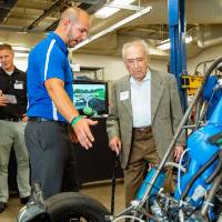 Seymour Padnos speaking with an engineering student.